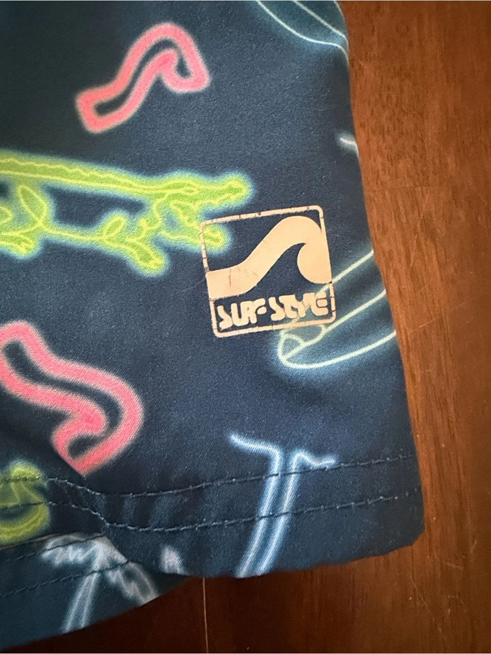 surf style Navy Swim Trunks with Neon Green, Pink and White Surf Prints